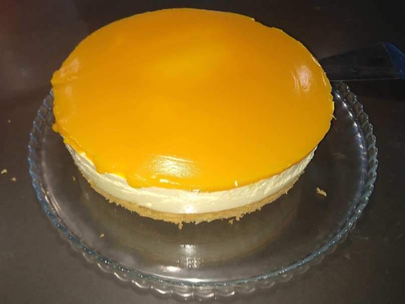 Mango mousse cake with sponge base and jello topping